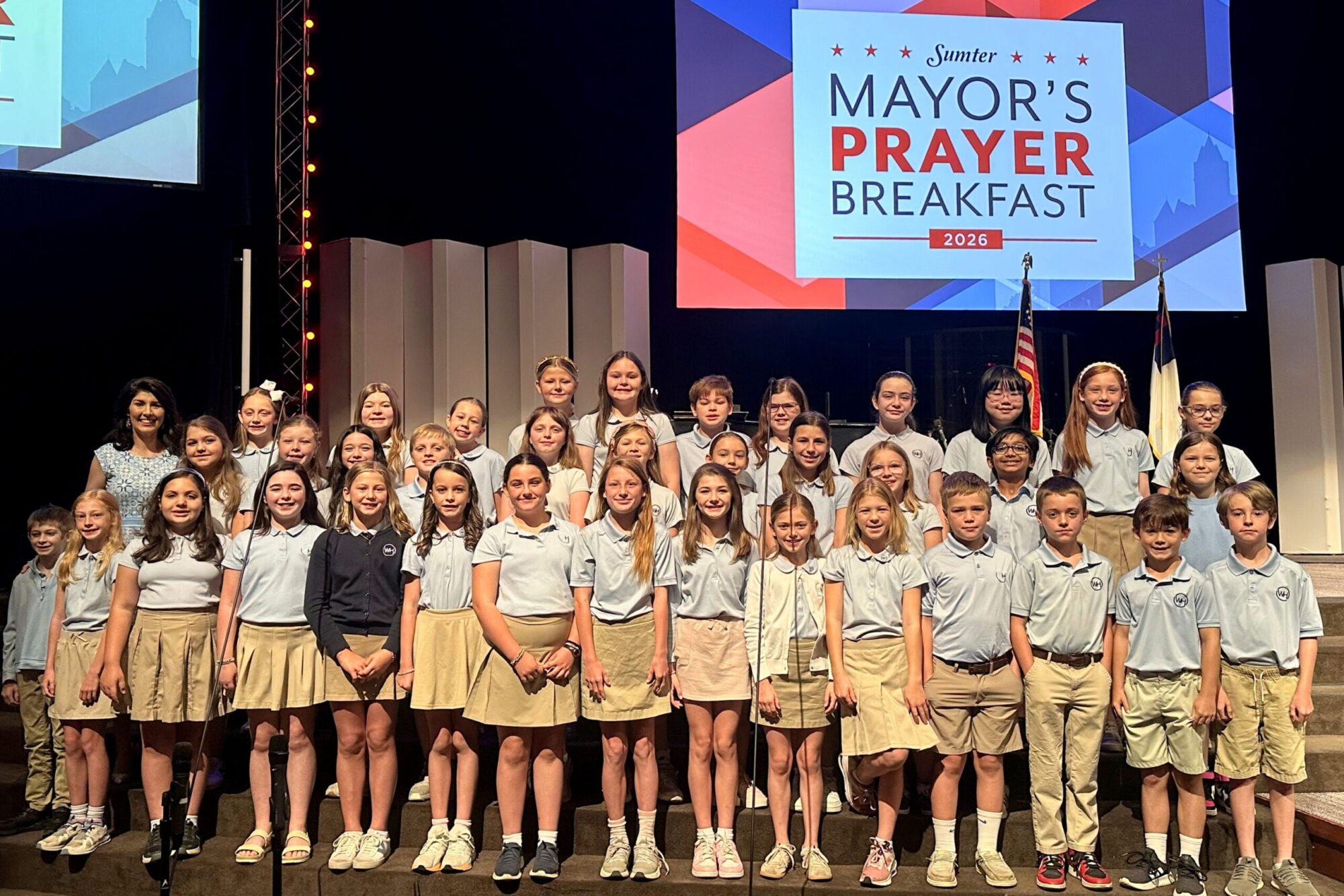 Wilson Hall prayer breakfast students on stage
