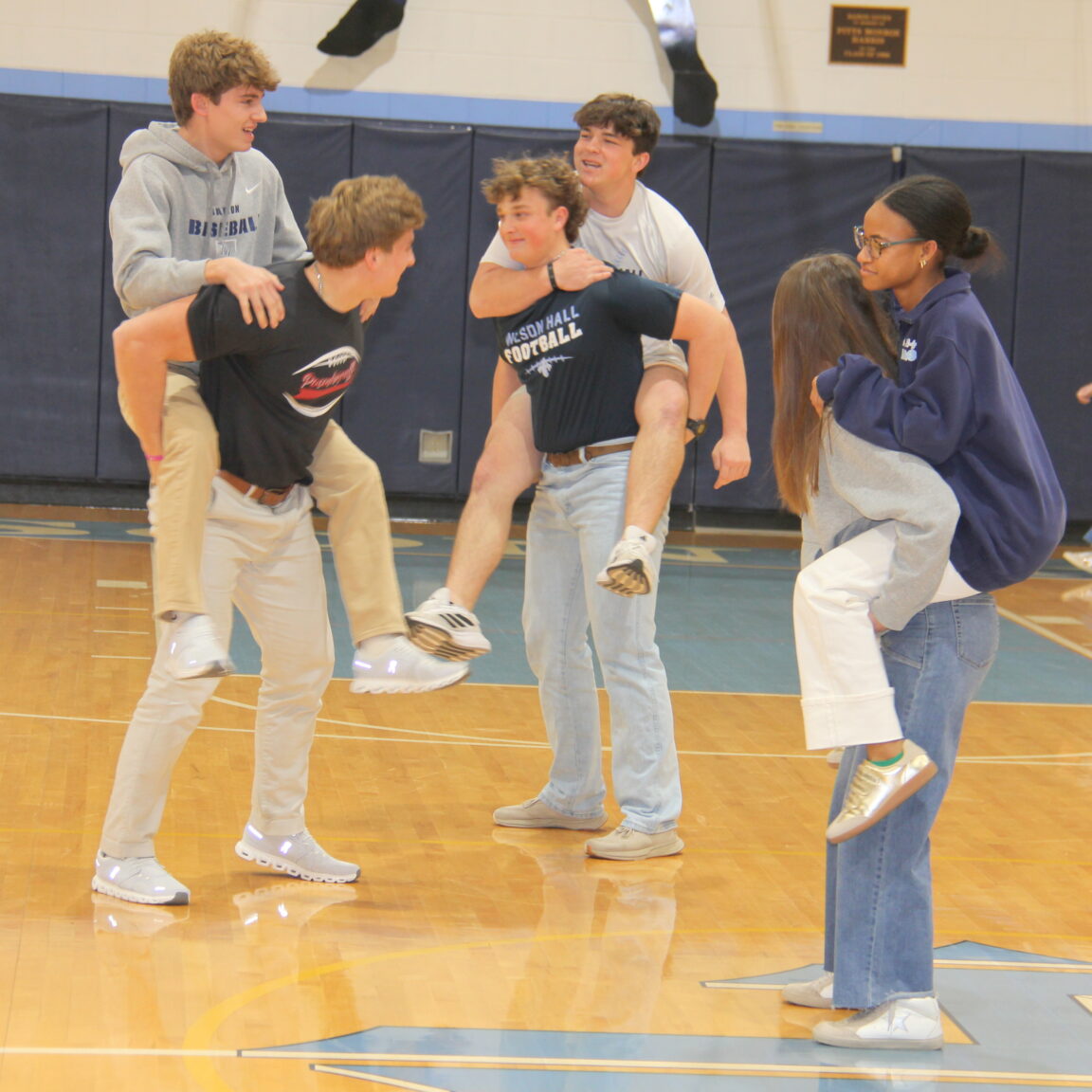 students participating in the chariot pep rally